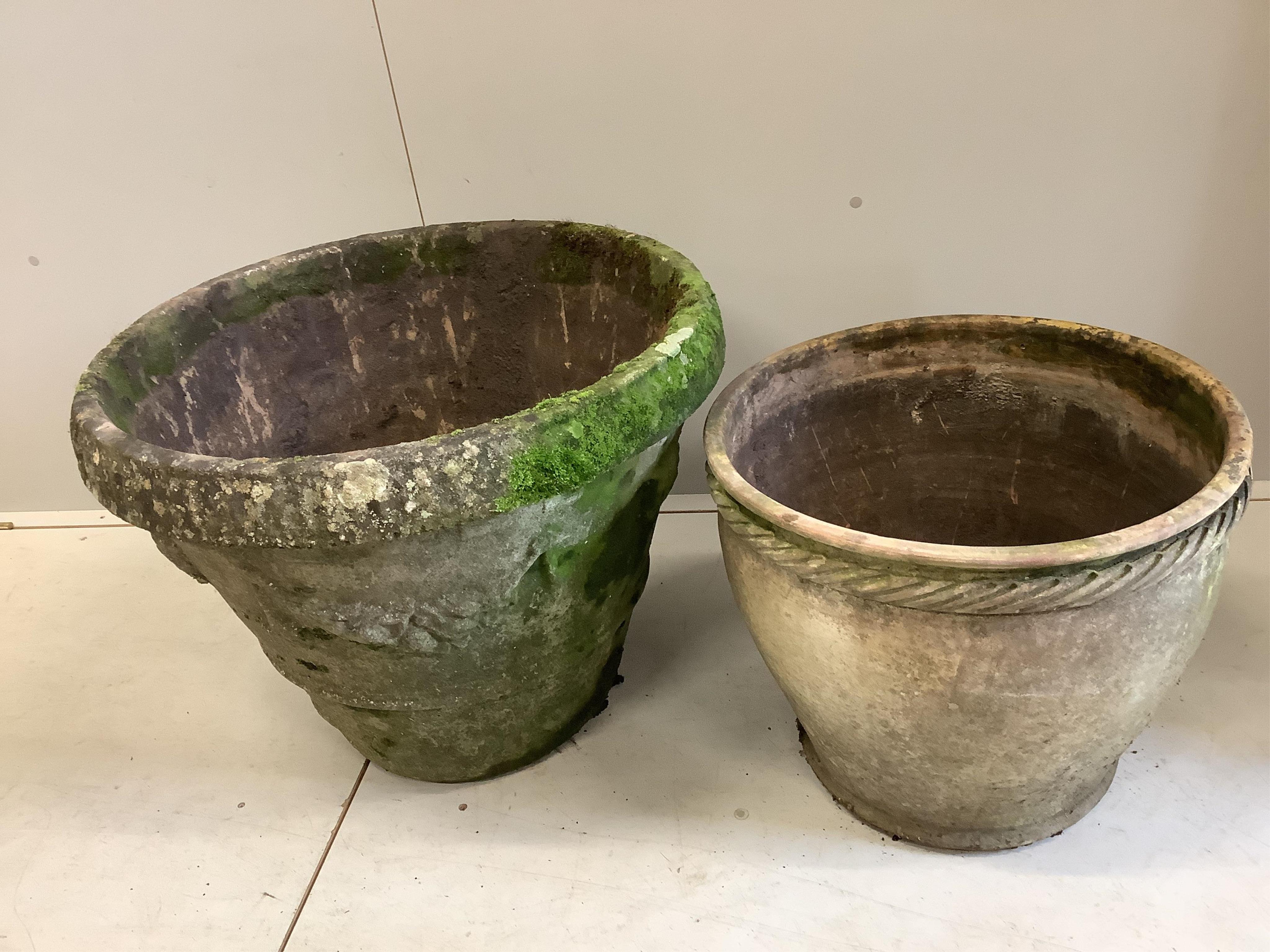 Two circular reconstituted stone and earthenware garden planters, larger diameter 67cm, height 50cm. Condition - fair